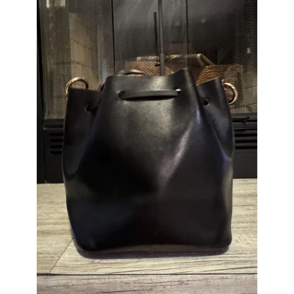 Dooney and Bourke smooth drawstring black green leather Serena Bucket bag purse